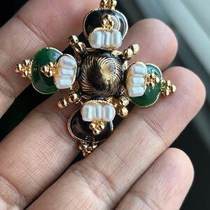 Elegant Gold and Green Brooch
